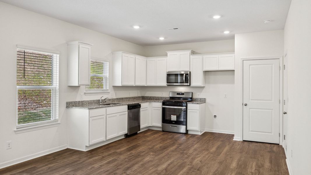 Furnished interior view inside a new home in The Hideaway at Fox Meadows, Bluff City (Image 6).