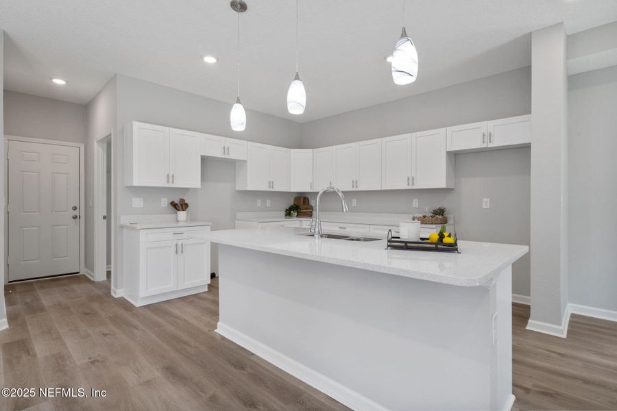 Furnished interior view inside a new home in , Fleming Island (Image 4).