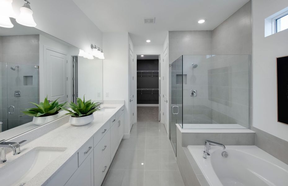 Owner's bathroom with dual sink vanity