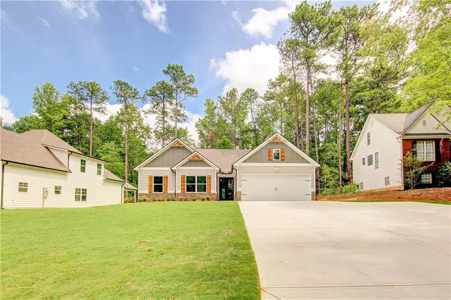 Front exterior of a new home in , Villa Rica, GA, highlighting curb appeal (Image 22).
