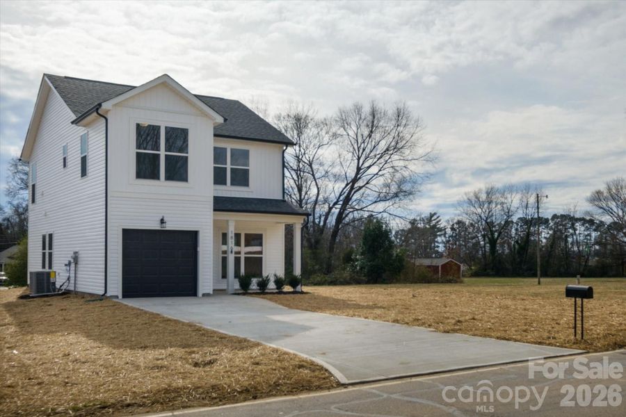 Front exterior of a new home in , Statesville, NC, highlighting curb appeal (Image 2). Front exterior of a new home in , Statesville, NC, highlighting curb appeal (Image 2).