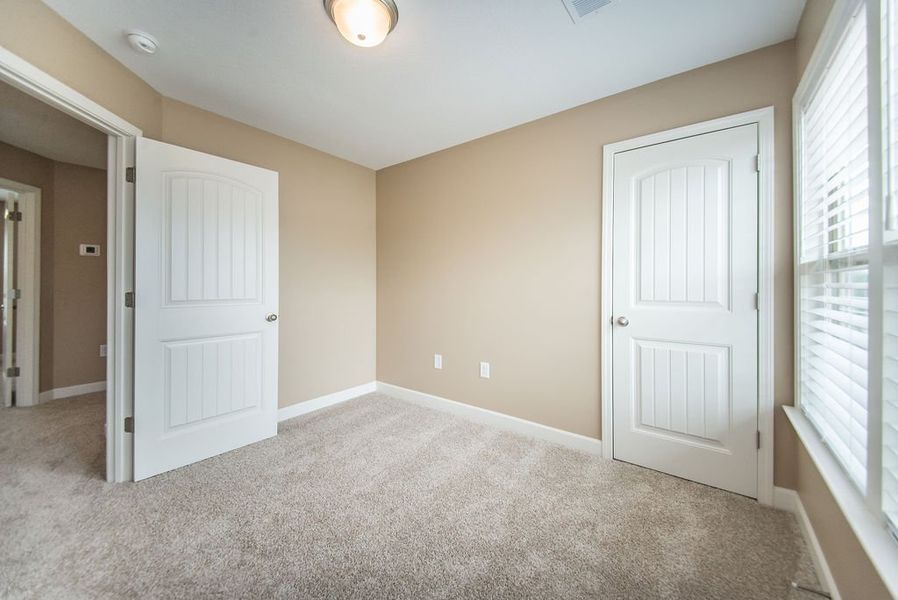 Representative unfurnished interior of a home built from the Reynolds by Enchanted Homes in Hampshire Heights, Moore (Image 32).