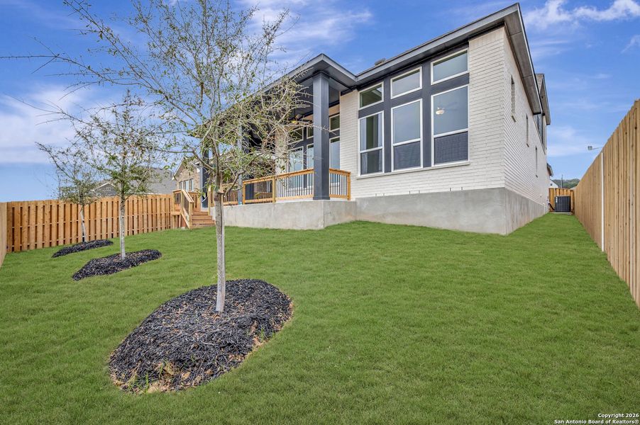Exterior details and patio area of a home in Windsong - Reserve Series, Boerne (Image 26).