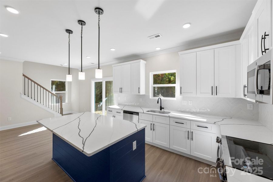 Furnished interior view inside a new home in , Huntersville (Image 11).