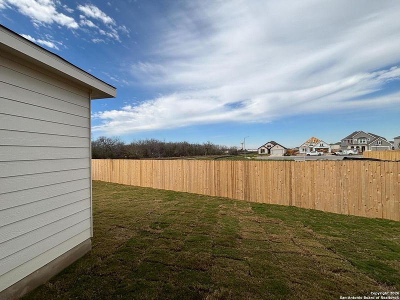 Exterior details and patio area of a home in The Summit at Saddlebrook Ranch 55's, Schertz (Image 22).
