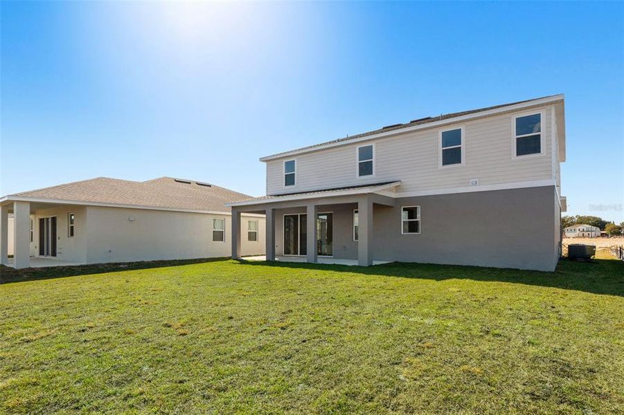 Exterior details and patio area of a home in Eden Crest, Apopka (Image 3).