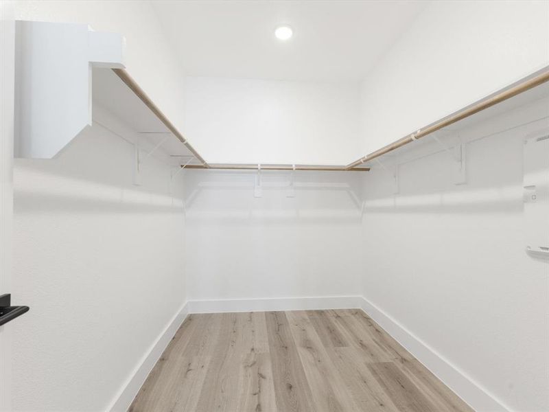 Spacious, unfurnished interior of a new home in Royal Court, Little Elm (Image 24).