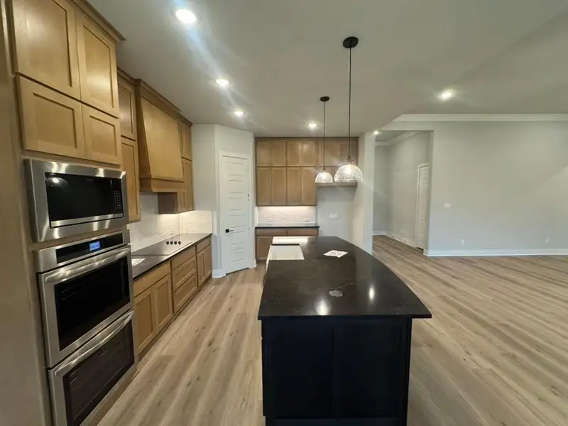 Furnished interior view inside a new home in , Van Alstyne (Image 6).