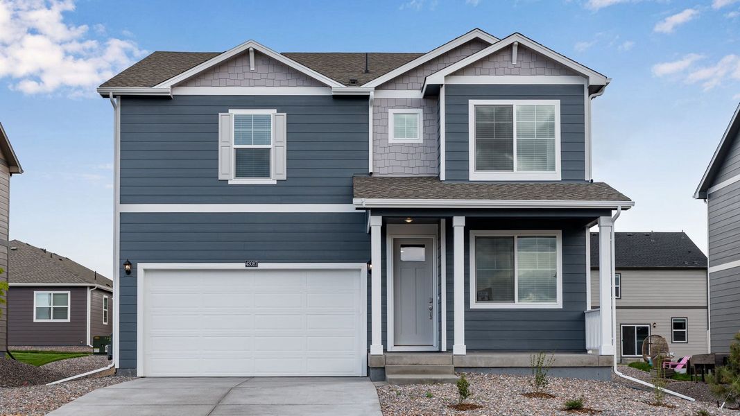 Front exterior of a new home in Spring Valley Ranch, Elizabeth, CO, highlighting curb appeal (Image 1). Front exterior of a new home in Spring Valley Ranch, Elizabeth, CO, highlighting curb appeal (Image 1).
