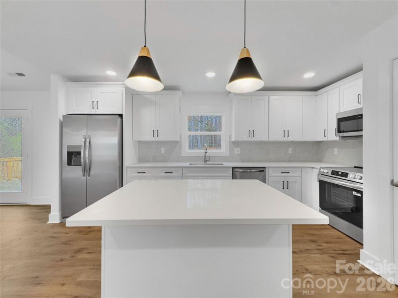 Island offers extra seating Island offers extra seating