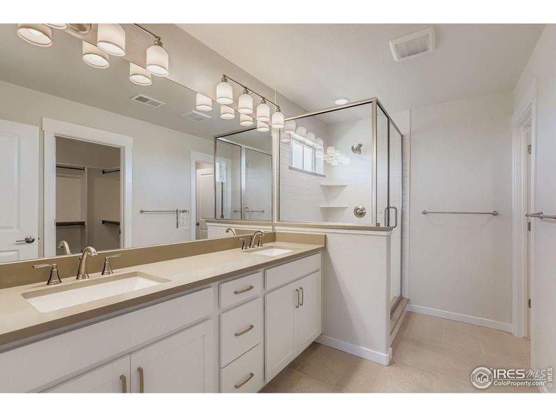 Furnished interior view inside a new home in Barefoot Lakes, Firestone (Image 10). Furnished interior view inside a new home in Barefoot Lakes, Firestone (Image 10).