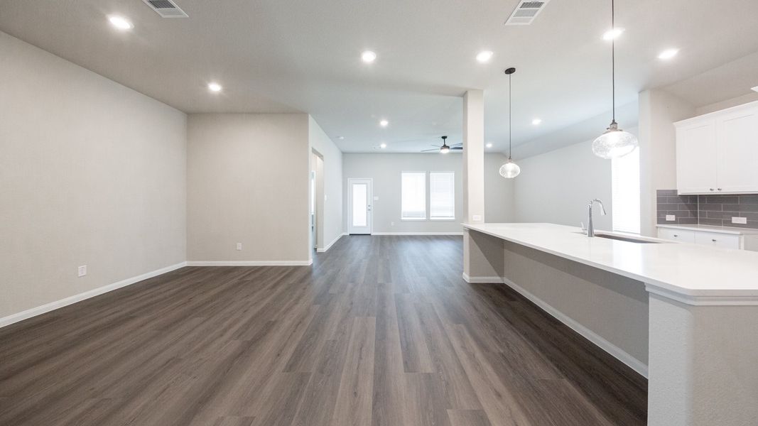 Dining Area and Kitchen to Family Room
