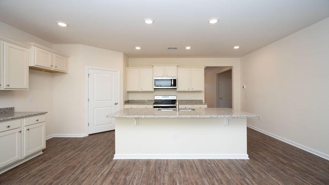 Representative furnished interior of a home built from the CALI by D.R. Horton in The Reserve at Wild Horse, Conway (Image 8).