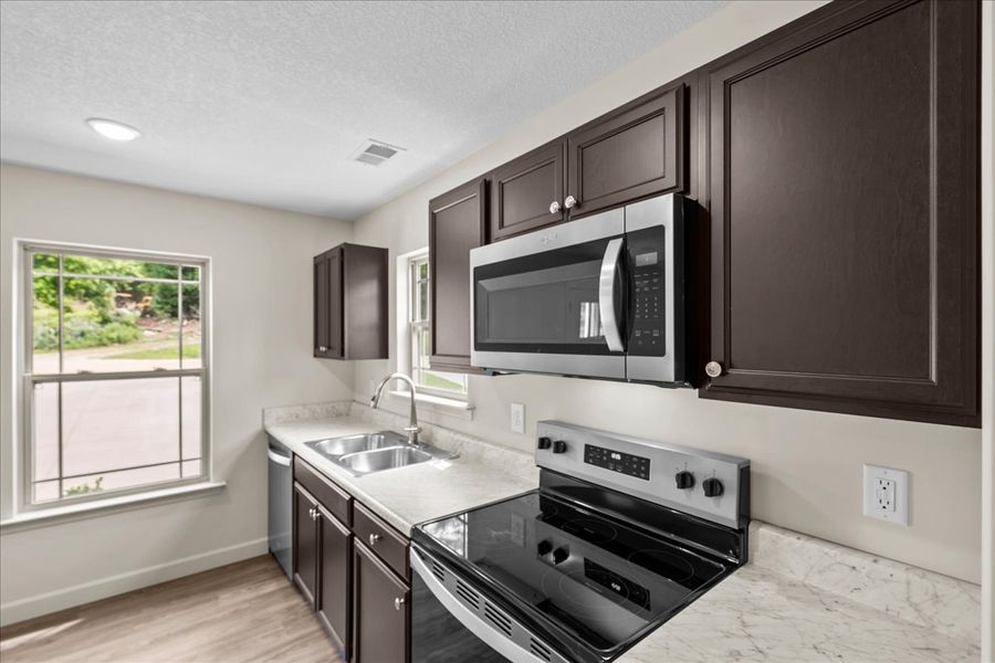 Representative furnished interior of a home built from the Branson by Enchanted Homes in Gentry Place, Spartanburg (Image 3).