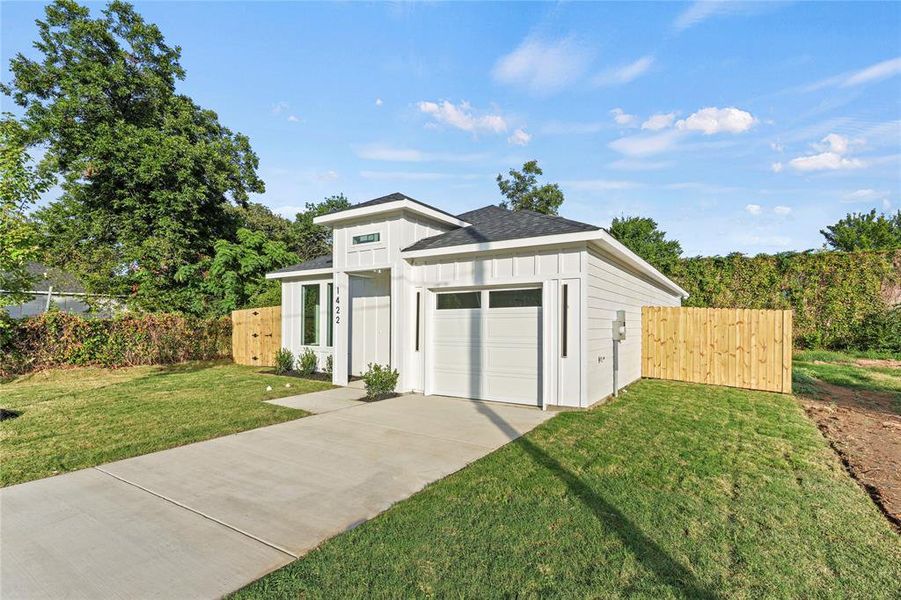 Front exterior of a new home in , Dallas, TX, highlighting curb appeal (Image 16).