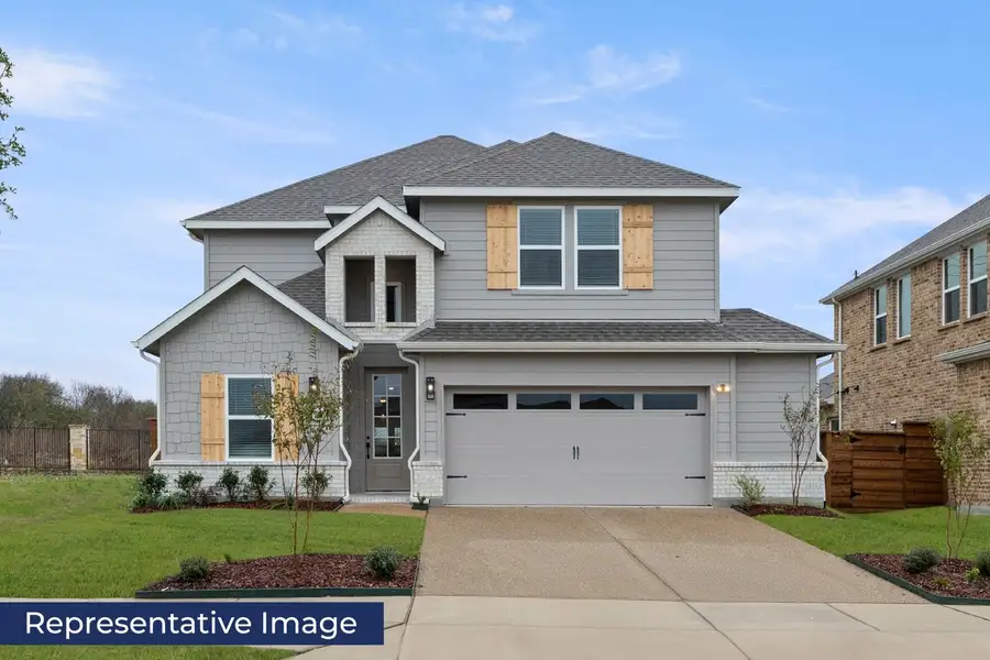 Representative exterior photo of a completed home built from the Ford F by First Texas Homes in The Meadows, Denton, TX (Image 1). Representative exterior photo of a completed home built from the Ford F by First Texas Homes in The Meadows, Denton, TX (Image 1).