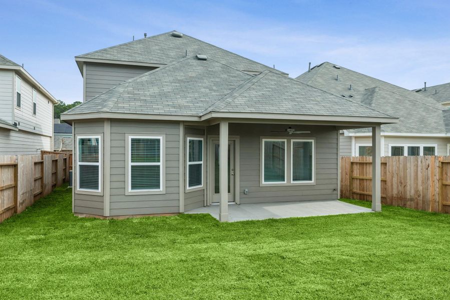Exterior details and patio area of a home in Lone Star Landing, Montgomery (Image 4). Exterior details and patio area of a home in Lone Star Landing, Montgomery (Image 4).