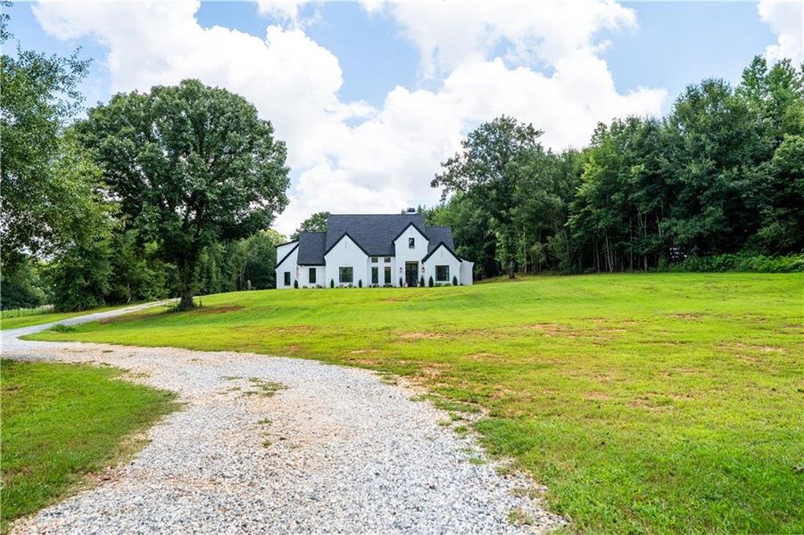 Front exterior of a new home in , Maysville, GA, highlighting curb appeal (Image 28).