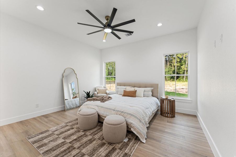 Retreat to the primary suite featuring high ceilings, large windows, and tranquil views.A perfect blend of space and serenity, designed for rest and relaxation. Retreat to the primary suite featuring high ceilings, large windows, and tranquil views.A perfect blend of space and serenity, designed for rest and relaxation.