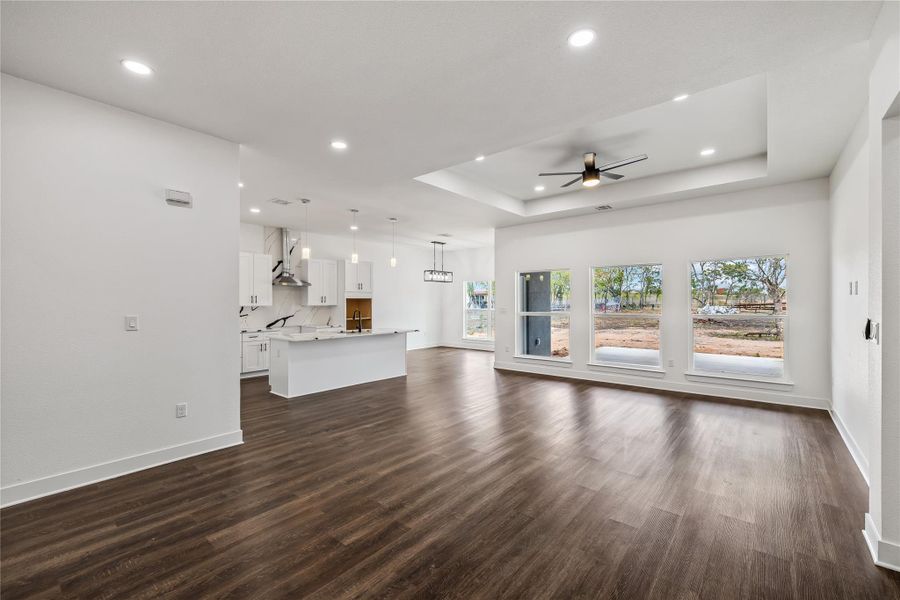 Living looking into kitchen and dining area