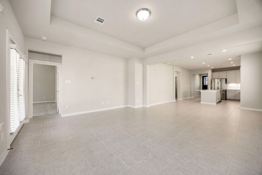 Family room with tray ceilings!