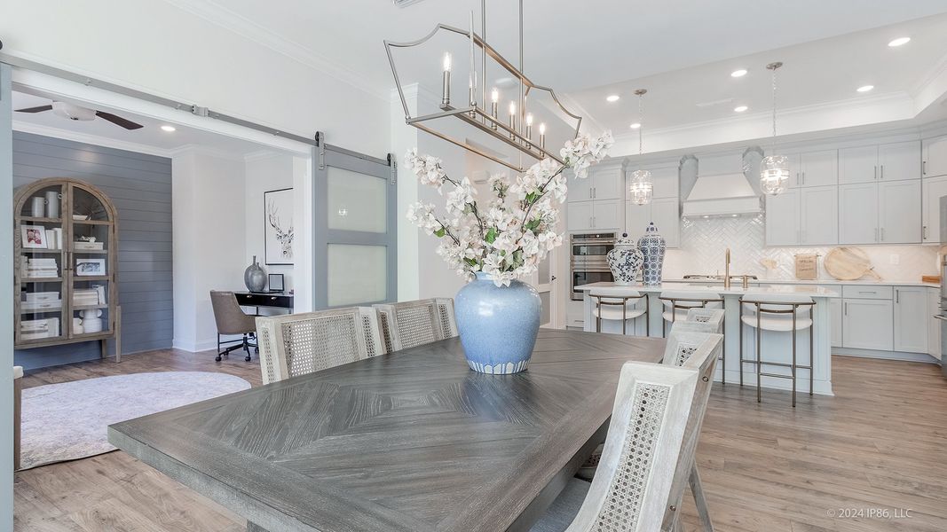 Representative furnished interior of a home built from the Promenade by Epcon Communities in The Courtyards at Bailey Farms, Dacula (Image 45).