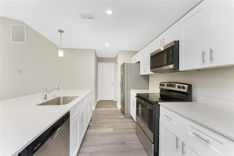 Furnished interior view inside a new home in , North Port (Image 13).