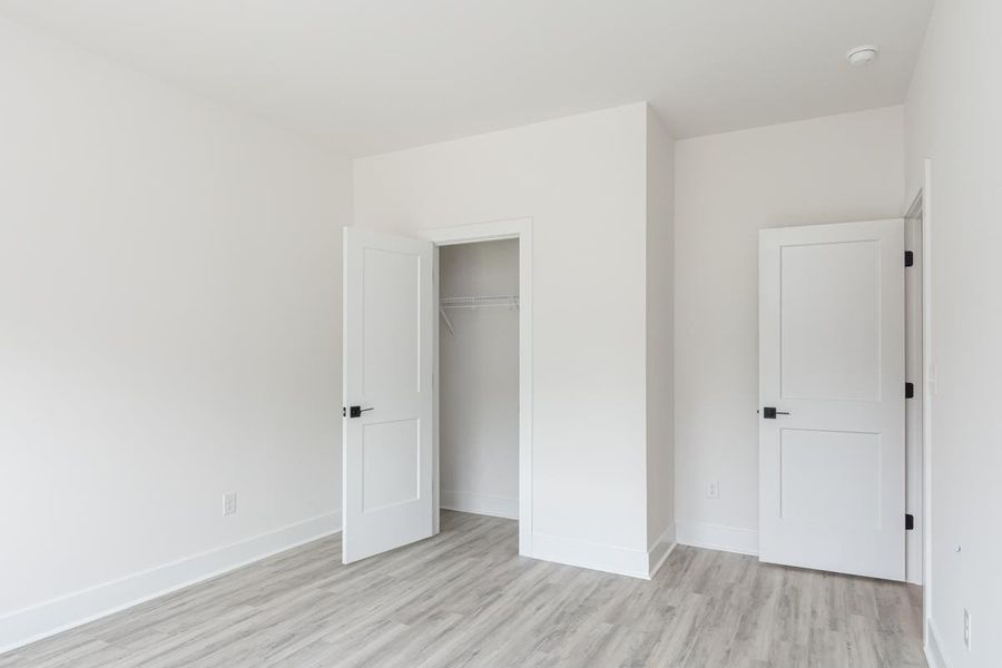 Representative unfurnished interior of a home built from the 1692 Townhome by Adams Homes in Parkstone Place Townhomes, Roebuck (Image 16).