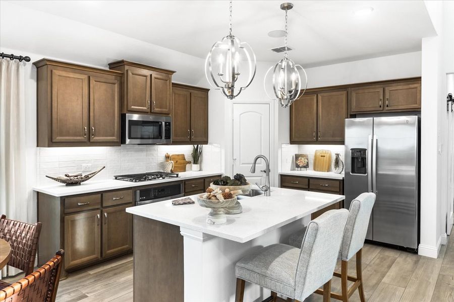 Furnished interior view inside a new home in The Reserve at Spiritas Ranch, Little Elm (Image 3).