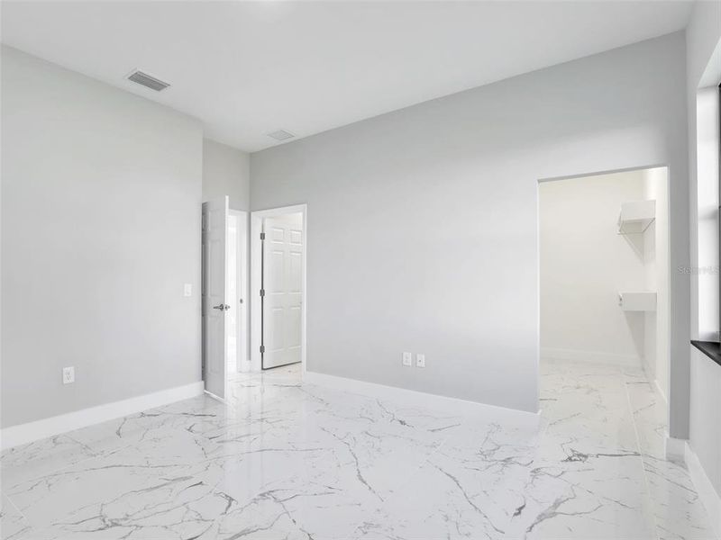 Spacious, unfurnished interior of a new home in , Cape Coral (Image 18). Spacious, unfurnished interior of a new home in , Cape Coral (Image 18).