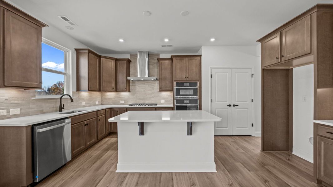 The Drayton Plan by DRB Homes in Farms at Bellingham, Mooresville NC - Kitchen