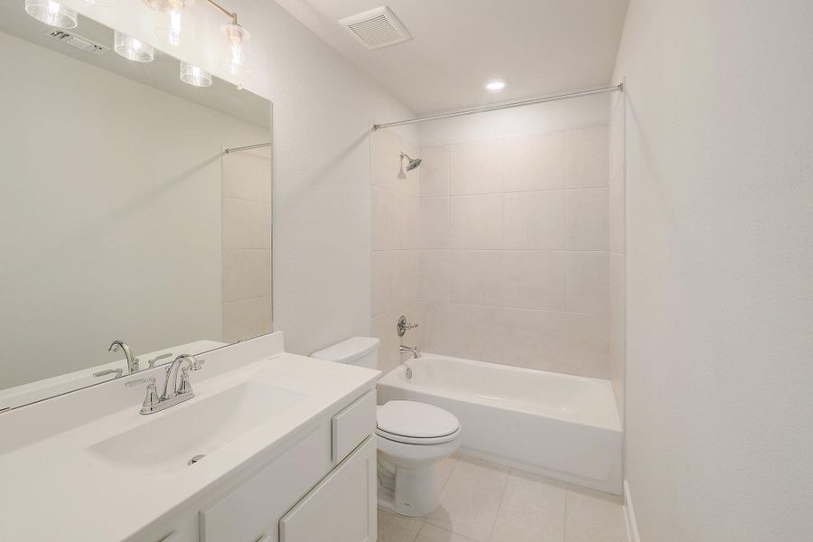 Furnished interior view inside a new home in Parmer Ranch - 60', Georgetown (Image 5).