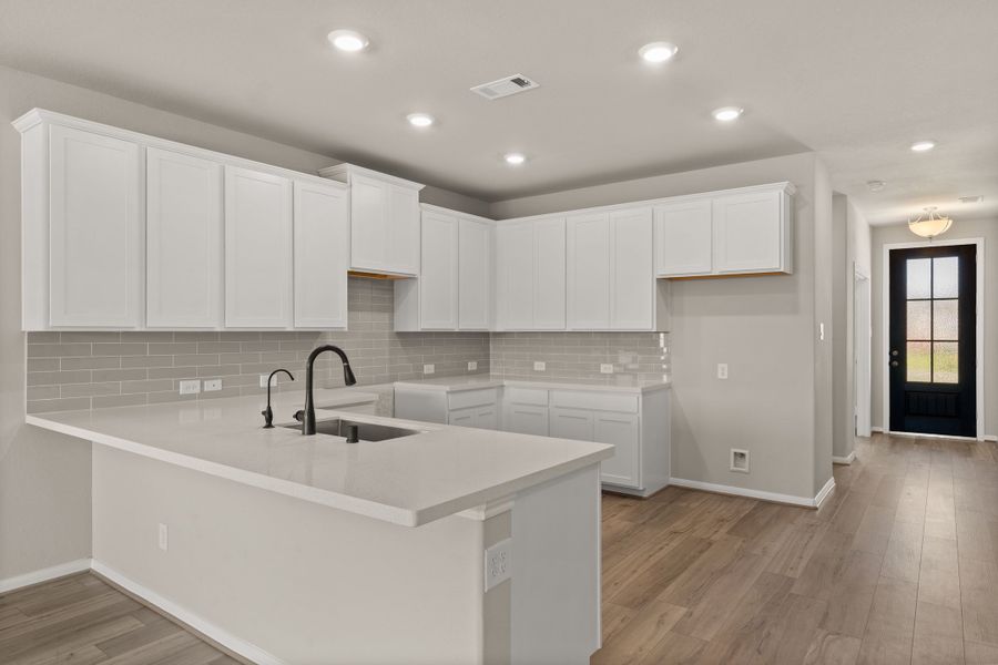 Kitchen.  Note: Sample product photo - actual exterior and interior selections may vary by homesite