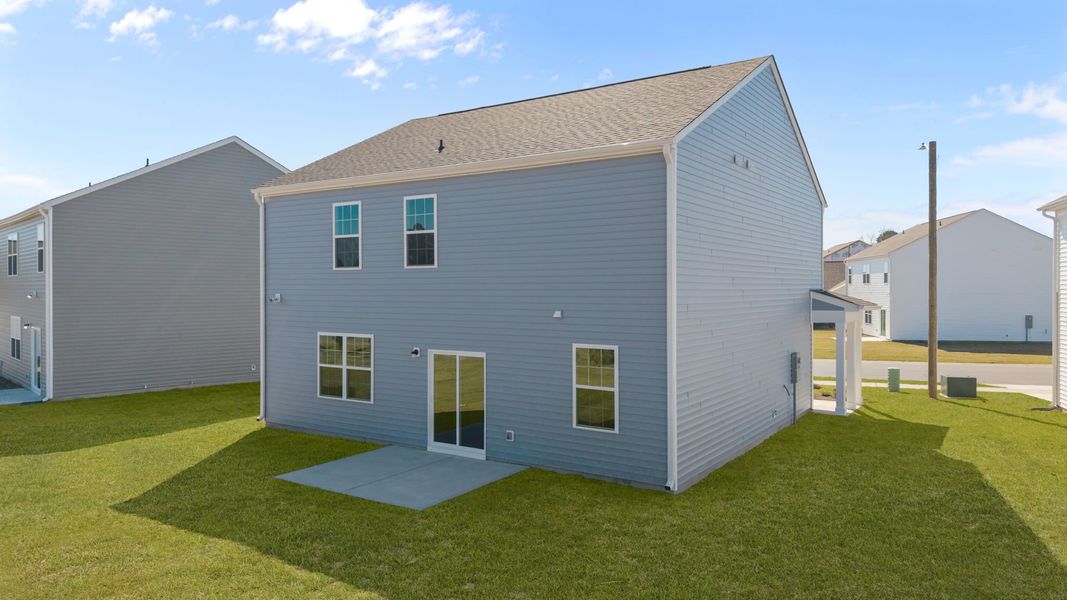 Exterior details and patio area of a home in Ridgewood Farms, Winterville (Image 15).