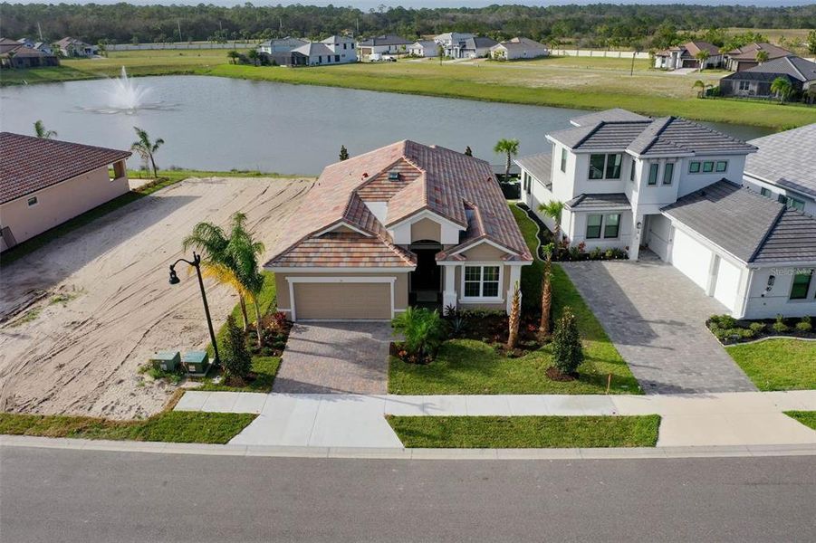 Front exterior of a new home in Marina Del Palma, Palm Coast, FL, highlighting curb appeal (Image 34).