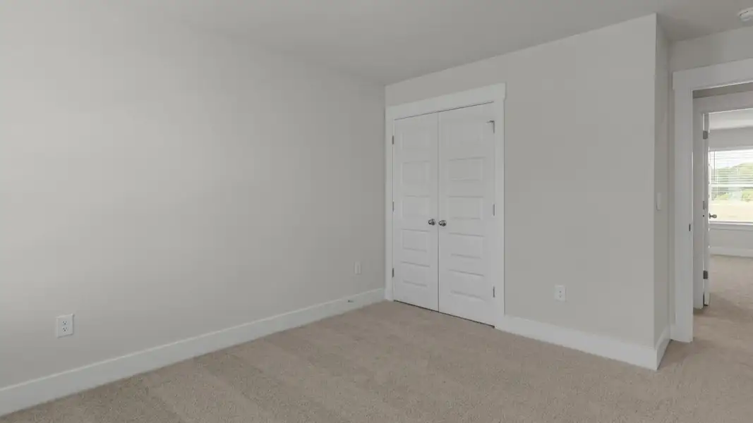 Spacious, unfurnished interior of a new home in The Highlands at Cedar Hill Landing, Navassa (Image 30).