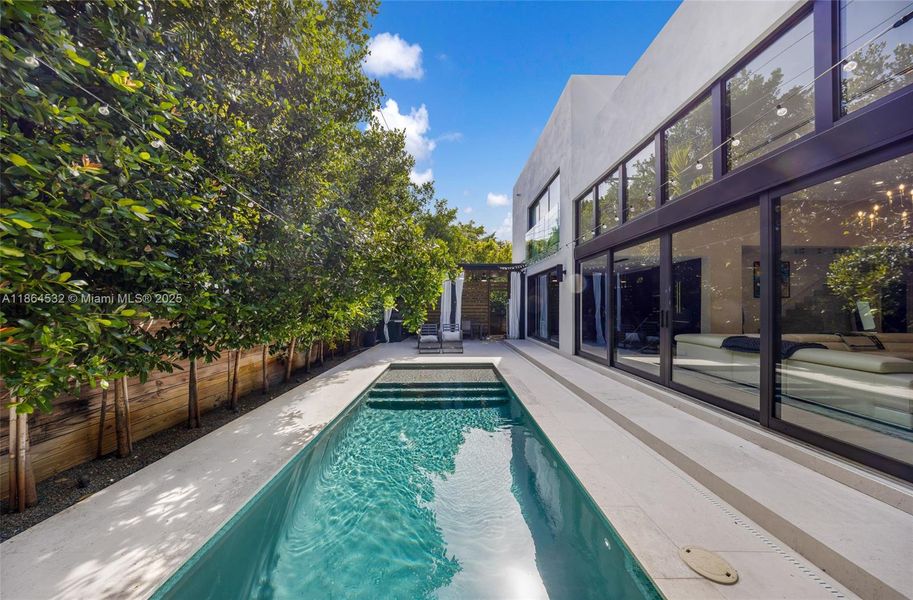 Exterior details and patio area of a home in , Miami (Image 3).