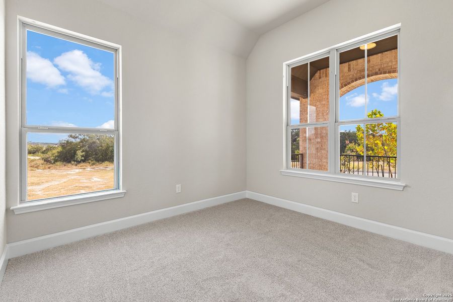 Spacious, unfurnished interior of a new home in The Enclave at Potranco Oaks, Castroville (Image 31).