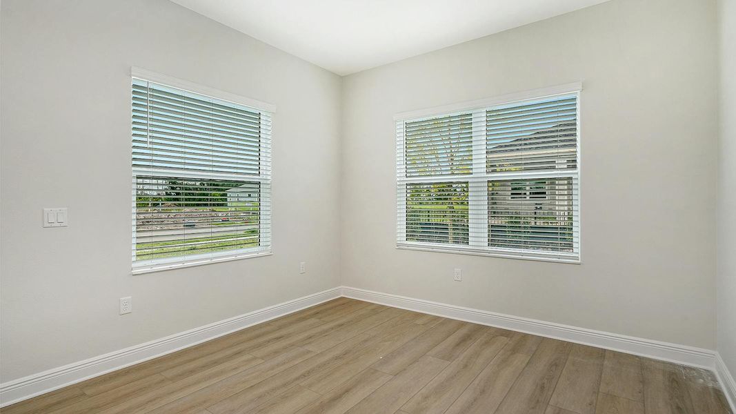 Spacious, unfurnished interior of a new home in Wildleaf Real Estate and Homes for Sale in Parrish, FL - Neal Communities, Parrish (Image 16).