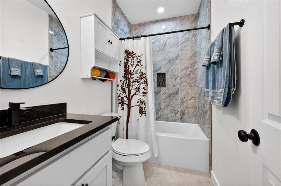 Guest Bathroom with Linen Closet, Tub & Shower with Tile Surround and Granite