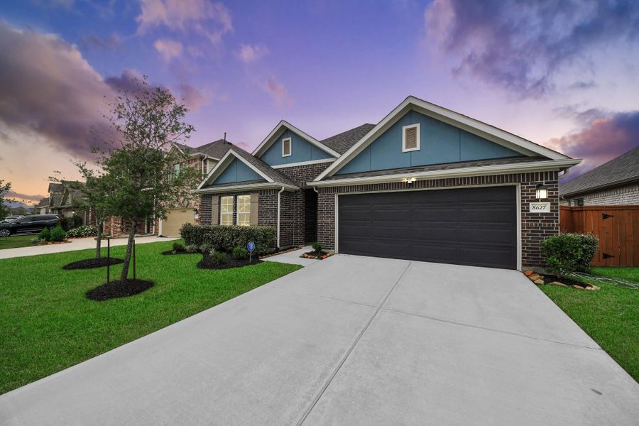 Front exterior of a new home in Marvida, Cypress, TX, highlighting curb appeal (Image 22).
