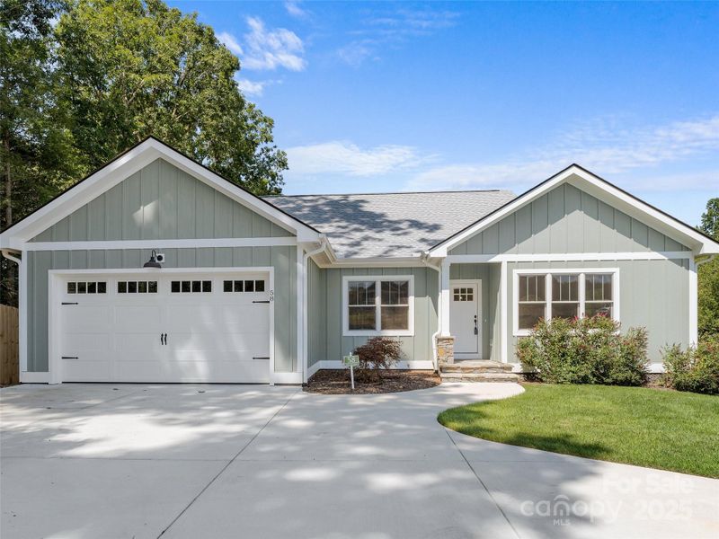 Front exterior of a new home in , Hendersonville, NC, highlighting curb appeal (Image 22).