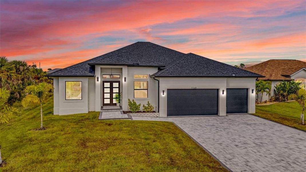 Front exterior of a new home in , Rotonda West, FL, highlighting curb appeal (Image 32). Front exterior of a new home in , Rotonda West, FL, highlighting curb appeal (Image 32).