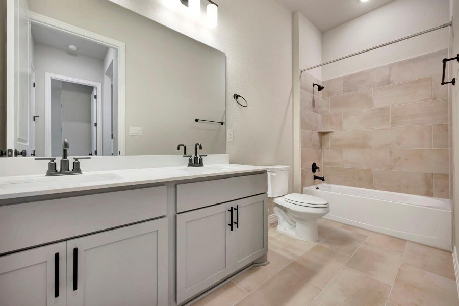 Furnished interior view inside a new home in Heritage, Dripping Springs (Image 10).