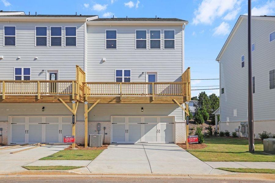 Front exterior of a new home in Somerset at Veterans Memorial, Mableton, GA, highlighting curb appeal (Image 20). Front exterior of a new home in Somerset at Veterans Memorial, Mableton, GA, highlighting curb appeal (Image 20).