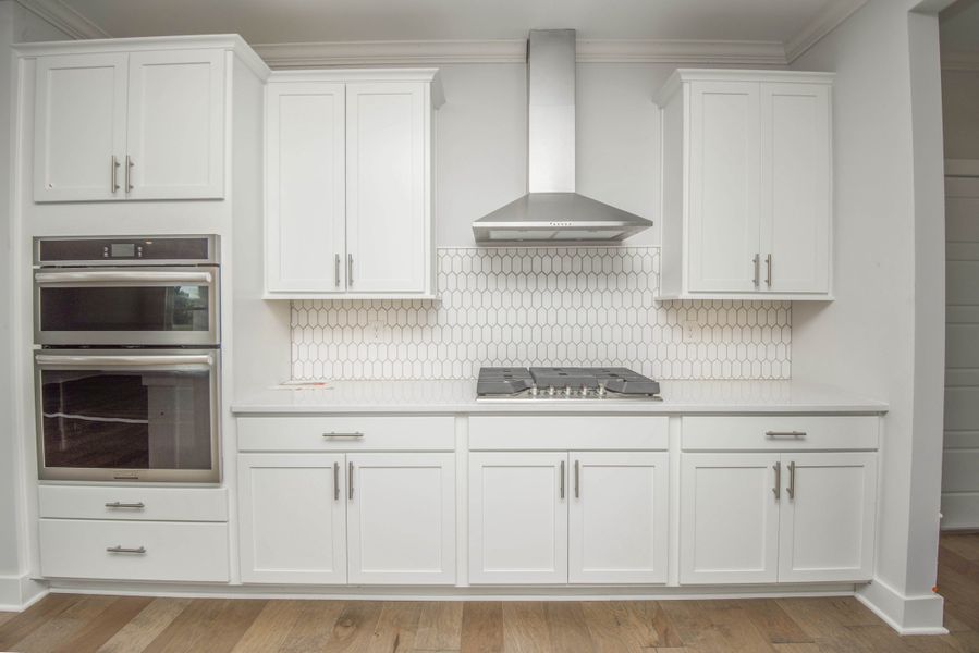 *Photo of example home. Selections and Finishes May Vary.* *Photo of example home. Selections and Finishes May Vary.*