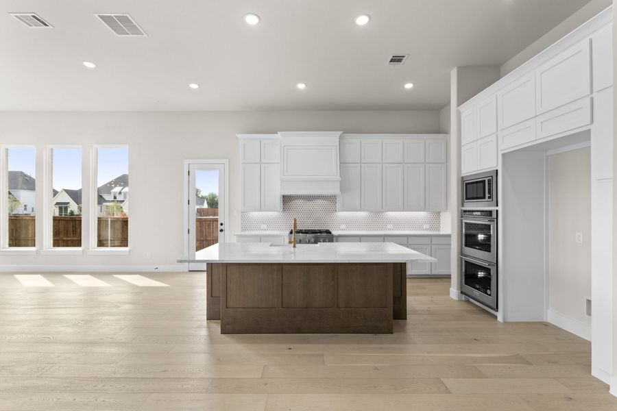 Representative furnished interior of a home built from the 5511 by Tradition Homes in Mustang Lakes, McKinney (Image 6).