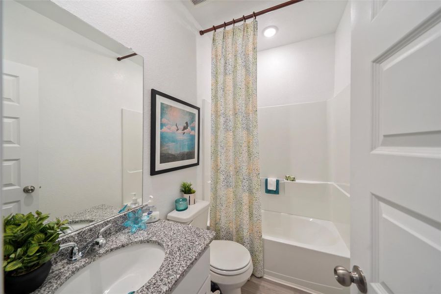 Furnished interior view inside a new home in Granger Pines, Conroe (Image 14).