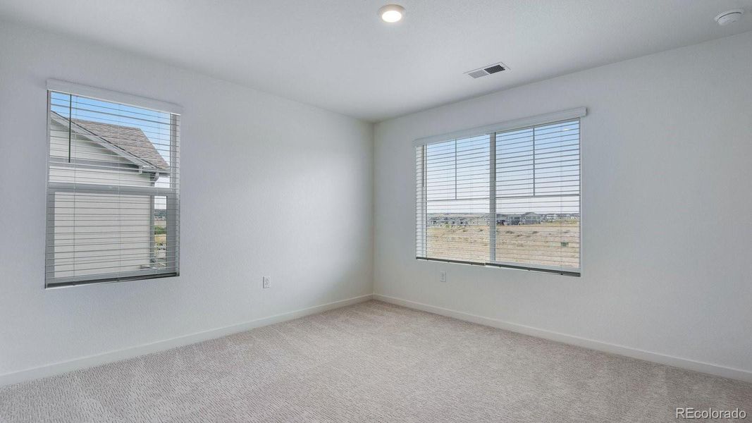 Spacious, unfurnished interior of a new home in Trails at Crowfoot, Parker (Image 26).