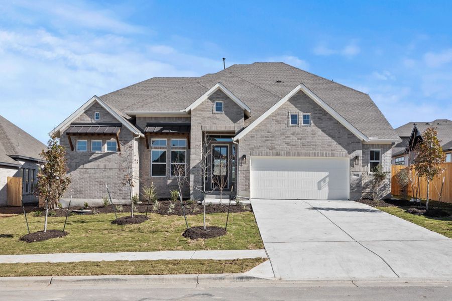 Representative exterior photo of a completed home built from the Remington by Chesmar Homes in Broken Oak, Georgetown, TX (Image 1). Representative exterior photo of a completed home built from the Remington by Chesmar Homes in Broken Oak, Georgetown, TX (Image 1).